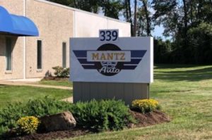 Shot of the Mantz Auto office sign in Milldale, CT